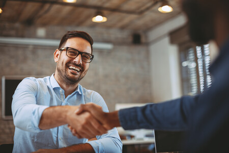 Business professionals discussing investment opportunities with Ripple Broadband